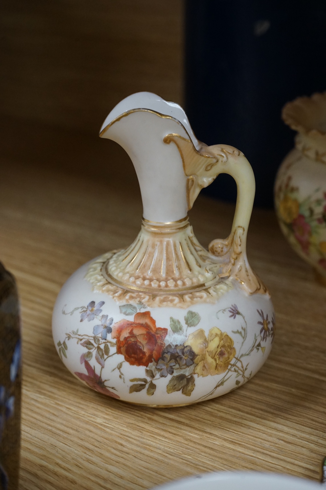 A Worcester butterfly handled cup and saucer and four other items, together with Royal Crown Derby, Dresden and Coalport items. (9). Tallest 13 cm